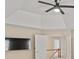 Spacious main bedroom features a tray ceiling with a ceiling fan at 740 Orchard Ct, Atlanta, GA 30328