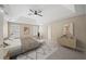 Well-decorated main bedroom showcasing a neutral color palette and tray ceiling at 740 Orchard Ct, Atlanta, GA 30328