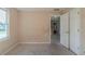 Empty bedroom showing a standard closet, and neutral walls at 1615 Burnt Oak Way, Dacula, GA 30019