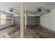 Spacious three-car garage with modern door openers and ample room for vehicles and storage at 1615 Burnt Oak Way, Dacula, GA 30019