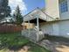 Backyard view showcasing the home's weathered two-tiered deck at 380 Paper Mill Rd, Lawrenceville, GA 30046