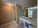 Bathroom with vanity, walk-in shower, and separate tub area at 380 Paper Mill Rd, Lawrenceville, GA 30046
