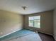 Bedroom with carpet and natural light through the window at 380 Paper Mill Rd, Lawrenceville, GA 30046