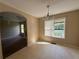 Dining room area filled with natural light from the windows at 380 Paper Mill Rd, Lawrenceville, GA 30046