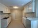 Kitchen featuring white cabinets and a double bowl sink at 380 Paper Mill Rd, Lawrenceville, GA 30046