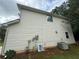 Side exterior view of home showing electrical and AC units at 380 Paper Mill Rd, Lawrenceville, GA 30046