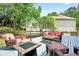 Inviting back deck area with comfortable seating, ideal for outdoor relaxation at 4619 Villa Chase Ne Dr, Marietta, GA 30068