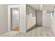 Unfinished basement area featuring neutral walls, carpeting, and an open doorway at 4619 Villa Chase Ne Dr, Marietta, GA 30068