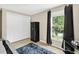 Bedroom featuring a closet, neutral walls, and natural light from the window at 4619 Villa Chase Ne Dr, Marietta, GA 30068