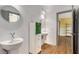 The bathroom features double vessel sinks and unique fixtures, showcasing a clean and modern design at 570 Matterhorn Way, Alpharetta, GA 30022