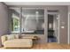 An ample bathroom boasts a soaking tub and large windows offering beautiful outdoor views at 570 Matterhorn Way, Alpharetta, GA 30022