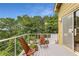 Inviting deck featuring outdoor seating, great view, and sliding glass door access to home at 570 Matterhorn Way, Alpharetta, GA 30022