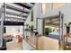 Bright entryway with open staircase and view to the living room and backyard at 570 Matterhorn Way, Alpharetta, GA 30022