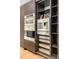 Close up of modern stainless steel appliances, coffee station, and pull out storage at 570 Matterhorn Way, Alpharetta, GA 30022