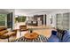 Open concept living space with kitchen, living, and dining areas, perfect for entertaining at 570 Matterhorn Way, Alpharetta, GA 30022