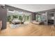 Bright bedroom with natural light from skylights and floor-to-ceiling windows at 570 Matterhorn Way, Alpharetta, GA 30022