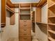 Well-organized walk-in closet with shelving, drawers, and hanging space at 570 Matterhorn Way, Alpharetta, GA 30022