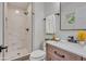 Modern bathroom featuring a glass-enclosed shower and stylish vanity with contemporary fixtures at 1733 Hollyhock Ter, Decatur, GA 30032