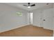 Bedroom features wood-look floors, a ceiling fan, and windows at 1733 Hollyhock Ter, Decatur, GA 30032