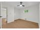 Bedroom features wood-look floors, ceiling fan, and bright windows at 1733 Hollyhock Ter, Decatur, GA 30032