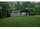 Charming home showcasing a freshly manicured front yard and modern exterior design at 1733 Hollyhock Ter, Decatur, GA 30032