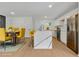 Open-concept kitchen with a large island, stainless appliances, and bright lighting at 1733 Hollyhock Ter, Decatur, GA 30032