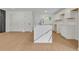 Kitchen with white cabinets and a large island with black hardware at 1733 Hollyhock Ter, Decatur, GA 30032