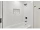 Modern shower with white subway tile and sleek fixtures at 1733 Hollyhock Ter, Decatur, GA 30032