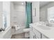 Bathroom showcasing a tub/shower, toilet, single sink vanity, and blue patterned shower curtain at 206 Maycrest Path, Tucker, GA 30084
