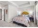 Bright bedroom with neutral walls, tray ceiling, and colorful floral bedding at 206 Maycrest Path, Tucker, GA 30084