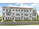 Attractive brick townhome exterior featuring symmetrical design and well-manicured landscaping at 206 Maycrest Path, Tucker, GA 30084