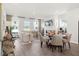 Bright living room featuring a modern fireplace, hardwood floors, and large windows for natural light at 206 Maycrest Path, Tucker, GA 30084