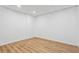Finished basement space with wood-look floors and ample natural light at 383 Oakridge Dr, Cartersville, GA 30121