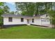 Charming single-Gathering home features a well-manicured lawn, and a two-car garage at 383 Oakridge Dr, Cartersville, GA 30121