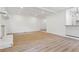 Spacious living room with hardwood floors, stone fireplace, neutral paint, and ample natural light at 383 Oakridge Dr, Cartersville, GA 30121
