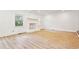 Spacious living room featuring a stone fireplace and hardwood floors at 383 Oakridge Dr, Cartersville, GA 30121