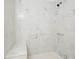 Bathroom with marble look shower, bench and shower head at 383 Oakridge Dr, Cartersville, GA 30121