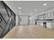 Finished basement features recessed lighting, wet bar and decorative accent wall at 525 Old Path Xing, Roswell, GA 30075