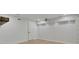 Finished basement with a unique wallpaper design and recessed lighting at 525 Old Path Xing, Roswell, GA 30075