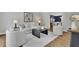 Inviting living room with hardwood floors, neutral decor, and ample seating, perfect for relaxation and entertaining at 525 Old Path Xing, Roswell, GA 30075