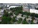 Birds-eye view of a neighborhood near commercial areas with ample green space at 1696 Hunting Creek Dr Se, Conyers, GA 30013