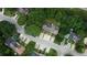 Aerial view of neighborhood streets featuring townhomes with street parking at 1696 Hunting Creek Dr Se, Conyers, GA 30013