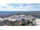 Aerial view of property close to commercial area with view of wooded area in the background at 4806 Forest Trl, Douglasville, GA 30135