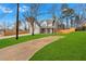 Charming two-story home featuring a gray exterior, two-car garage, well-kept lawn, and welcoming covered front porch at 4806 Forest Trl, Douglasville, GA 30135