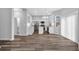 Modern kitchen and dining area with an island, stainless steel appliances, and hardwood floors for stylish living at 4806 Forest Trl, Douglasville, GA 30135