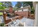 Multi-tiered wooden deck and patio provides outdoor entertaining with easy access to backyard at 839 Cardova Ne Dr, Atlanta, GA 30324