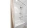 Elegant bathroom featuring a tub-shower with a tiled surround, ideal for relaxing at 839 Cardova Ne Dr, Atlanta, GA 30324