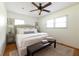 Serene bedroom with neutral tones, a plush bed, and warm hardwood flooring at 839 Cardova Ne Dr, Atlanta, GA 30324