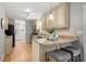 Lovely kitchen with granite countertops, stainless appliances, breakfast bar seating and beautiful cabinets at 839 Cardova Ne Dr, Atlanta, GA 30324