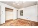 Bedroom with hardwood floors and an open closet at 270 Bromack Se Dr, Atlanta, GA 30315